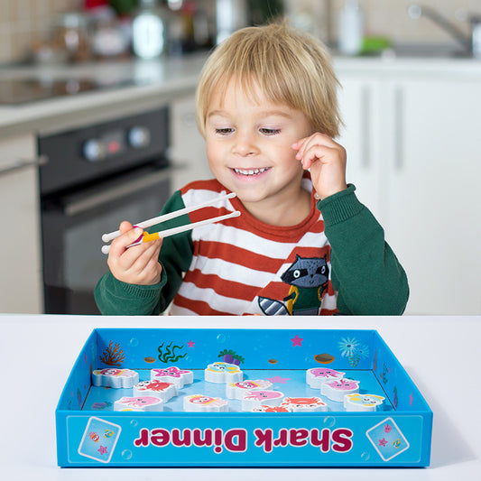 Children's puzzle shark feeding game