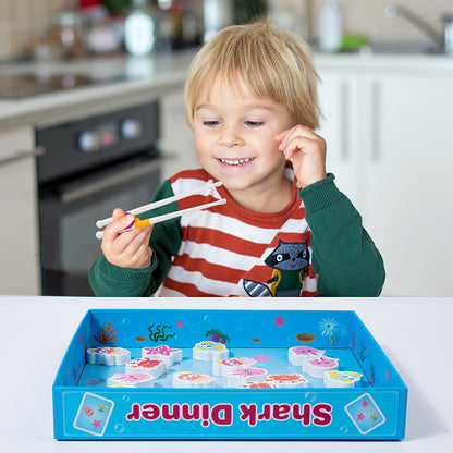 Children's puzzle shark feeding game